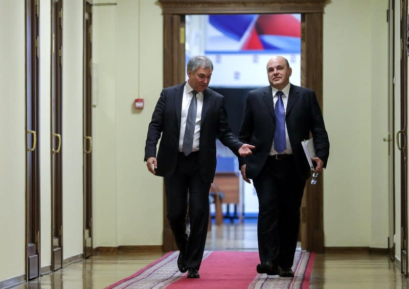 Russia's State Duma Speaker Vyacheslav Volodin and Mikhail Mishustin, who was nominated by Russian President Vladimir Putin as the candidate for the post of Prime Minister, walk before a meeting at the State Duma in Moscow