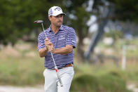 Kevin Kisner reacts to a missed birdie putt on the 18th hole during the first playoff hole against Robert Streb during the final round of the RSM Classic golf tournament, Sunday, Nov. 22, 2020, in St. Simons Island, Ga. (AP Photo/Stephen B. Morton)