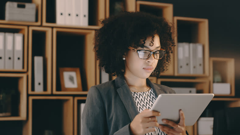 A woman using an iPad