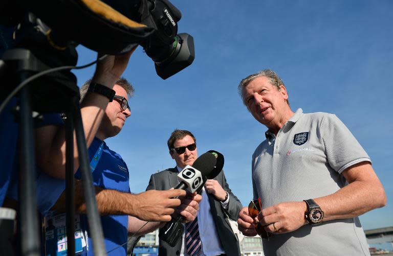 England manager Roy Hodgson speaks to the media after arriving in Rio de Janeiro on June 8, 2014, ahead of the 2014 FIFA World Cup in Brazil