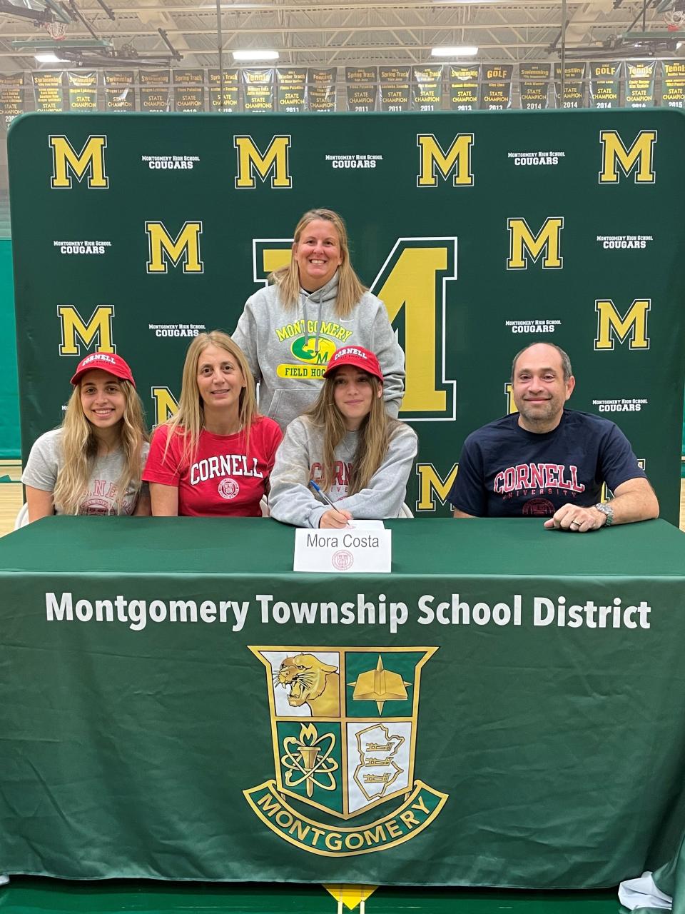 Montgomery's Mora Costa signs her National Letter of Intent to play field hockey at Cornell University on Wednesday, Nov. 10, 2021.
