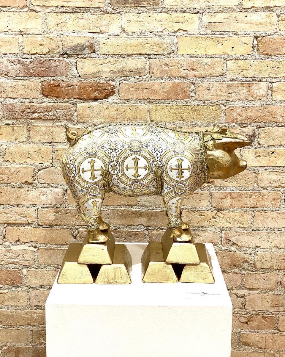 Kyle Fokken's “Piggy Bank” series is on exhibit at The Whit Gallery in downtown St. Cloud through Jan. 22.