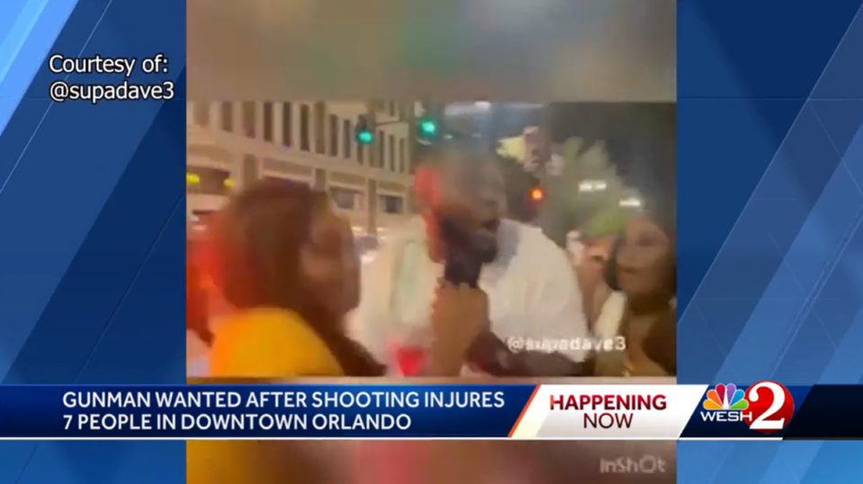 Video footage shared on social media shows witnesses reacting to the rounds of gunfire being sent into a busy crowd early in the morning on Sunday in downtown Orlando (WESH/video screengrab)