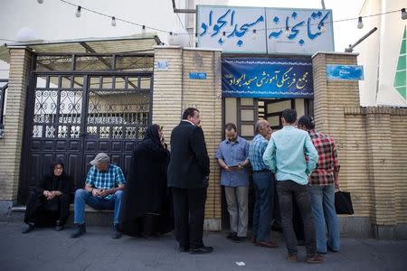 Iranian people wait for ballot box open to vote during the presidential election in Tehran, Iran, May 19, 2017. TIMA via REUTERS