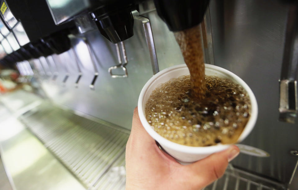 <div class="caption-credit">Photo by: Getty Images</div><b>Super-sized sodas</b>: In September, New Yorkers bid <a href="http://yhoo.it/T62f2k" rel="nofollow noopener" target="_blank" data-ylk="slk:farewell to the extra-large soda option;elm:context_link;itc:0;sec:content-canvas" class="link ">farewell to the extra-large soda option</a> in movie theaters and fast food joints. The city's Board of Health outlawed the sale of large sugary drinks in the hopes of tackling the obesity problem one soda fountain at a time.