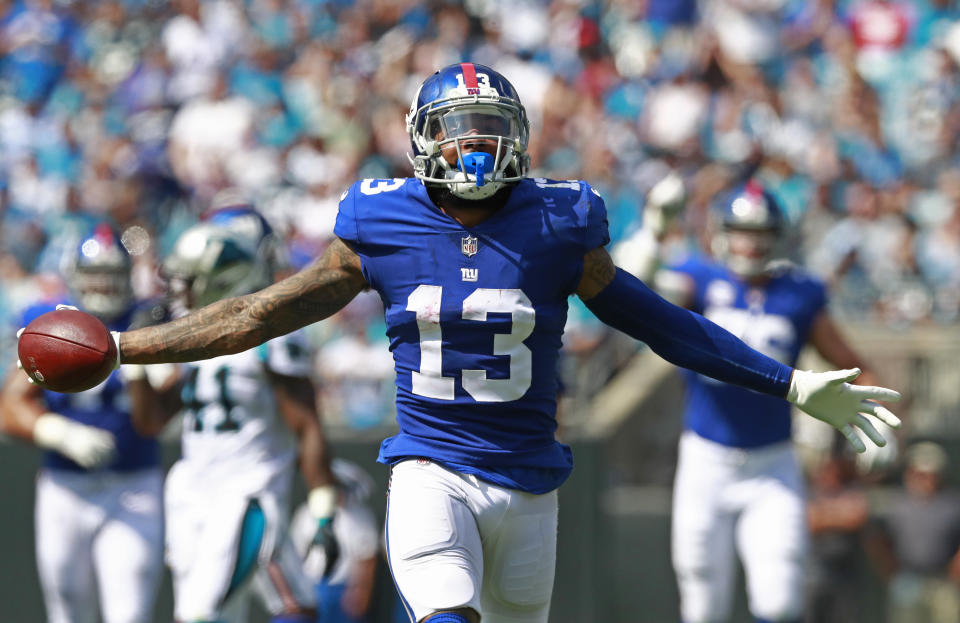 New York Giants' Odell Beckham (13) celebrates a catch against the Carolina Panthers in the first half of an NFL football game in Charlotte, N.C., Sunday, Oct. 7, 2018. (AP Photo/Jason E. Miczek)