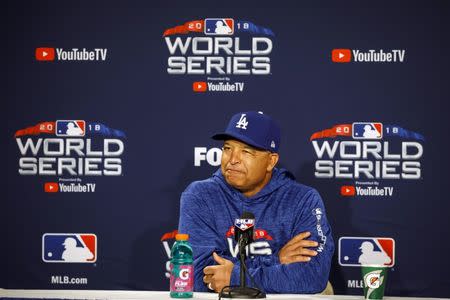 FILE PHOTO: Oct 22, 2018; Boston, MA, USA; Los Angeles Dodgers manager Dave Roberts (30) speaks to reporters during media day one day prior to the 2018 World Series at Fenway Park. Mandatory Credit: David Butler II-USA TODAY Sports/File Photo