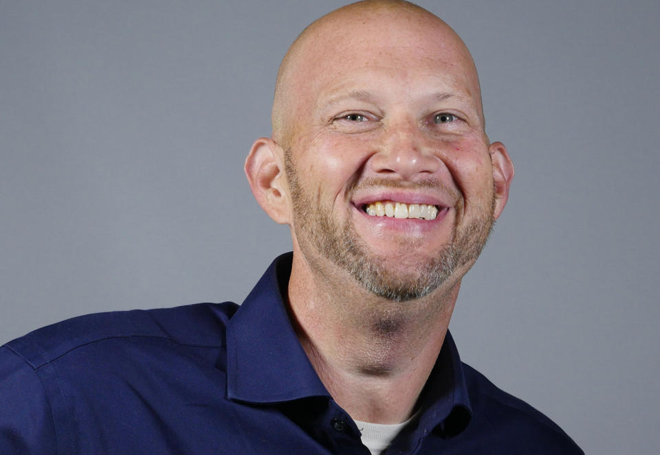 Smiling headshot of Chris Sitarov.