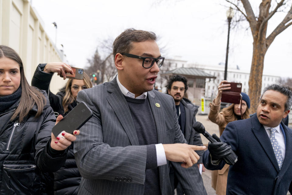 Rep. George Santos, R-N.Y., leaves a House GOP conference meeting on Capitol Hill in Washington, Wednesday, Jan. 25, 2023. (AP Photo/Andrew Harnik)