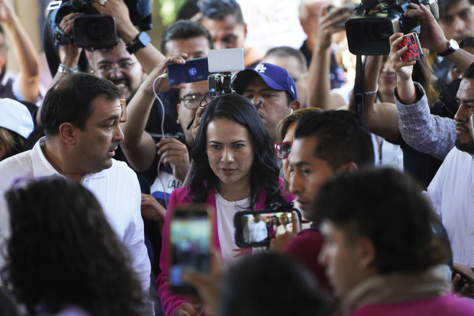 Alejandra del Moral, who is running for governor of Mexico state with the PRI-PAN-PRD coalition, arrives to cast her ballot during the local elections in Cuautitlán Izcalli, Mexico state, Mexico, Sunday, June 4, 2023. (AP Photo/Marco Ugarte)