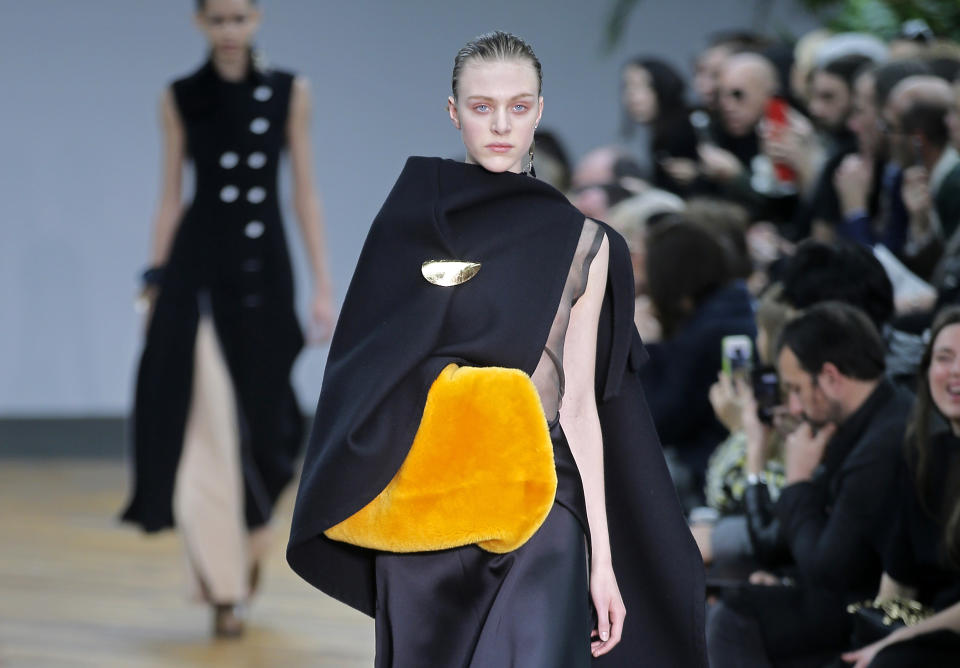 A model wears a creation for Celine's ready-to-wear fall/winter 2014-2015 fashion collection presented in Paris, Sunday, March 2, 2014. (AP Photo/Lionel Cironneau)