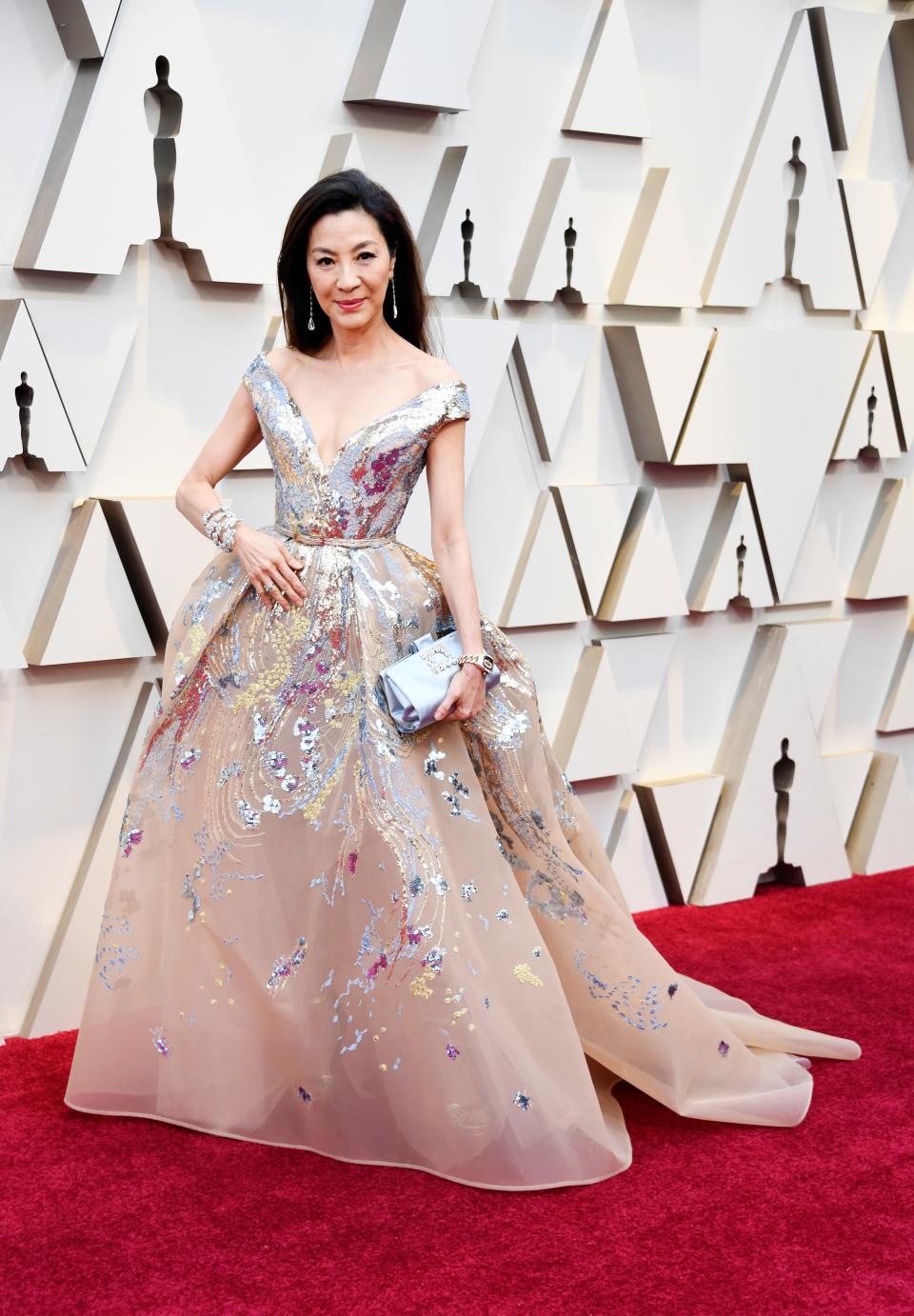 <h1 class="title">Michelle Yeoh in Elie Saab and Chopard jewelry with a Roger Vivier bag</h1><cite class="credit">Photo: Getty Images</cite>