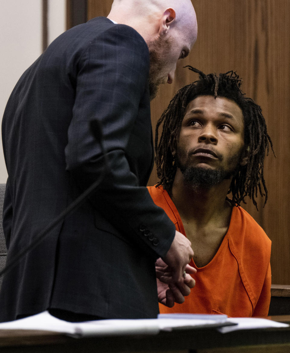 Nicholas Jordan, 25, speaks with his legal counsel during his first appearance in El Paso County 4th Judicial Court, Friday, Feb. 23, 2024, in Colorado Springs, Colo. Jordan was arrested Monday, Feb. 19, in the deaths of his roommate, Samuel Knopp, 24, and Celie Rain Montgomery, 26, at the University of Colorado Colorado Springs. (Parker Seibold/The Gazette via AP, Pool)