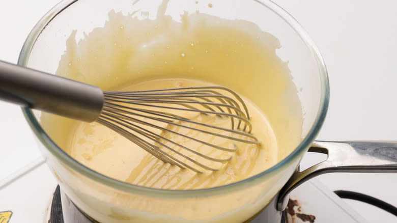 Whisking zabaglione in a bowl