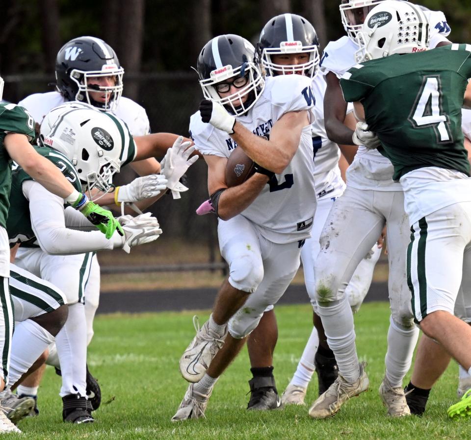 SOUTH YARMOUTH    09/30/22  Nolan Mosscrop of Nantucket attempts to get through the Dennis-Yarmouth defense.  football