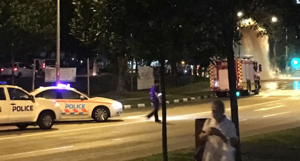 Police and SCDF vehicles on the scene at Bukit Batok West. (Photo: Lee Mei Zhen)