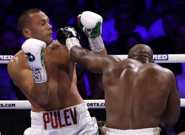 Derek Chisora, right, pins Kubrat Pulev back