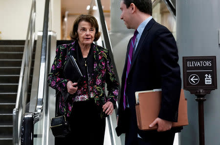 Senator Barbara Feinstein (D-CA) walks with an aide after a vote attempting to override U.S. President Donald Trump's veto of the resolution demanding an end to support of Saudi Arabia's war in Yemen failed on Capitol Hill in Washington, U.S., May 2, 2019. REUTERS/Joshua Roberts