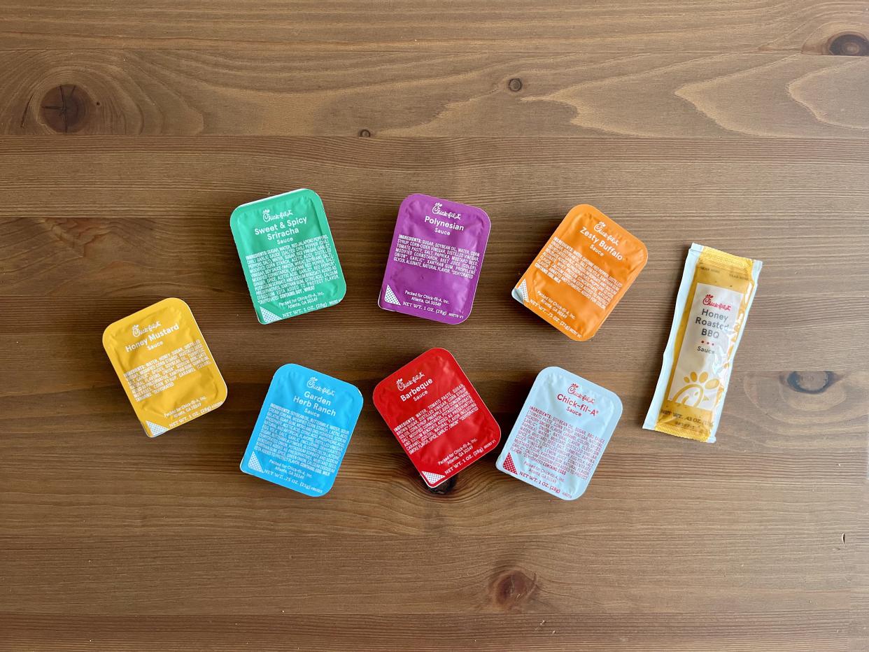 all of the chick fil a sauces on a table