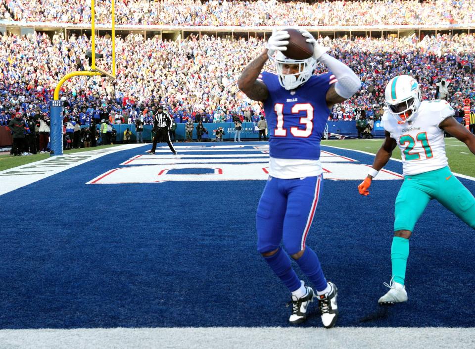 Bills receiver Gabe Davis keeps is fee in bounds for a touchdown against <a class="link " href="https://sports.yahoo.com/nfl/teams/miami/" data-i13n="sec:content-canvas;subsec:anchor_text;elm:context_link" data-ylk="slk:Miami;sec:content-canvas;subsec:anchor_text;elm:context_link;itc:0">Miami</a>’s <a class="link " href="https://sports.yahoo.com/nfl/players/28435/" data-i13n="sec:content-canvas;subsec:anchor_text;elm:context_link" data-ylk="slk:Eric Rowe;sec:content-canvas;subsec:anchor_text;elm:context_link;itc:0">Eric Rowe</a>. This turned out to be the game winning touchdown as the Bills beat Miami 34-31 in the wildcard playoff game.