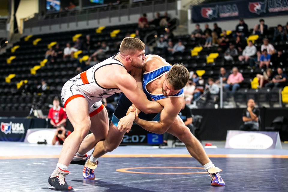 Braxton Amos, left, wrestles Haydn Maley at 97 kg during the final session of the USA Wrestling World Team Trials Challenge Tournament, Sunday, May 22, 2022, at Xtream Arena in Coralville, Iowa.
