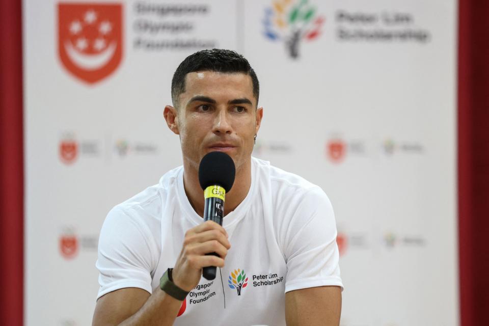 Football superstar Cristiano Ronaldo takes part in an event to support youth scholarships founded by philanthropist Peter Lim in Singapore. 