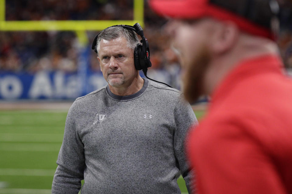 FILE - In this Dec. 31, 2019, file photo, Utah head coach Kyle Whittingham walks the sideline during the first half of the Alamo Bowl NCAA college football game against Texas in San Antonio. Whittingham was not all that surprised when his team was picked to finish third in the south division during the preseason Pac-12 media poll. (AP Photo/Eric Gay, File)