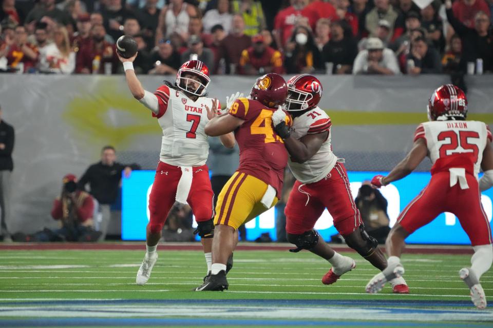 Utah quarterback Cameron Rising (7) throws the ball against Southern California in the second half of the Pac-12 Championship at Allegiant Stadium.