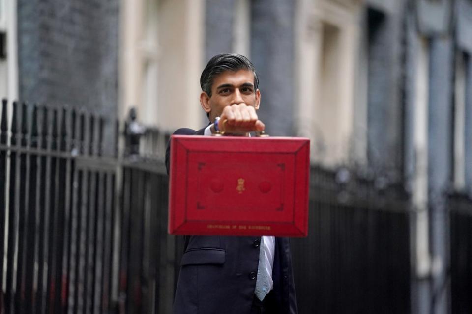 Chancellor Rishi Sunak holds his ministerial red box (Victoria Jones/PA) (PA Wire)