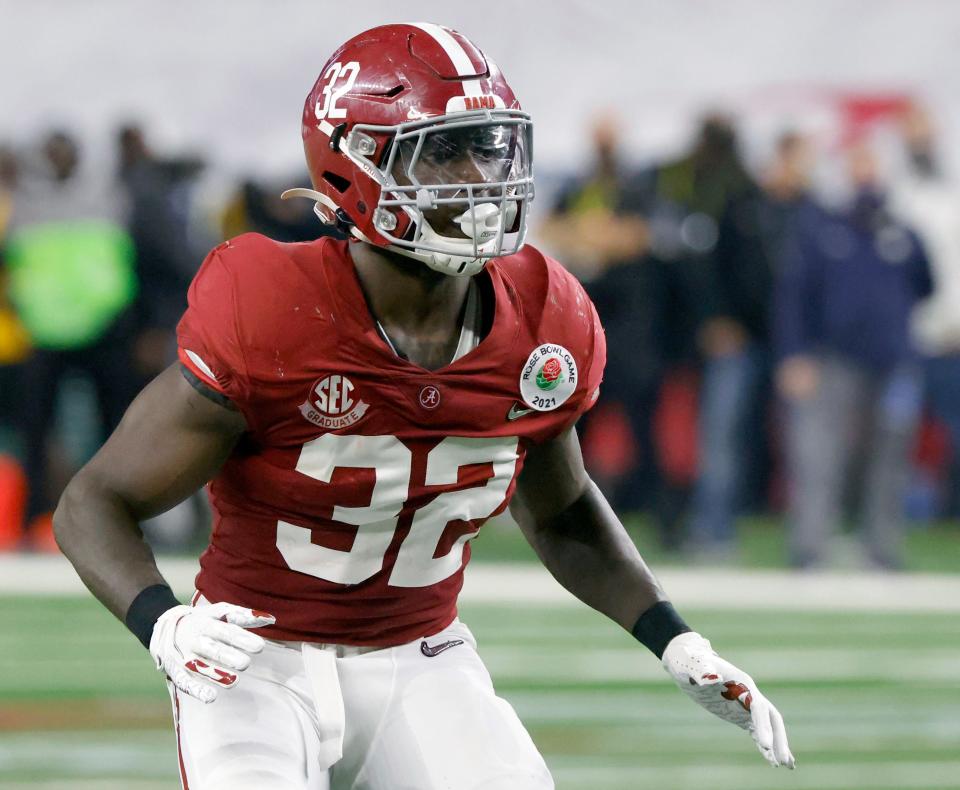 Alabama linebacker Dylan Moses (32) plays against Notre Dame during the Rose Bowl NCAA college football game in Arlington, Texas, Friday, Jan. 1, 2021. In a recent Instagram post, Moses detailed his struggles with physical problems "fighting through pain every single game" and disclosed his grandmother's death. "It's been times I wanted to quit and times I wanted to walk away from my dreams," he posted. (AP Photo/Ron Jenkins)