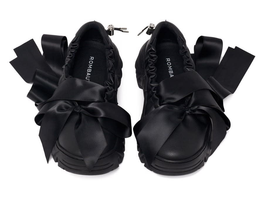 Rombaut’s ballet sneakers mimic the laces on the traditional dance shoe, with thick, satin ribbons that tie around the ankle. Rombaut