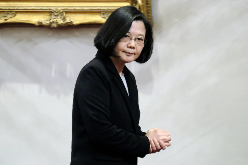 Taiwan's President Tsai Ing-wen leaves after speaking during a press conference at the Presidential Palace in Taipei on January 2, 2019. - Taiwan's unification with the mainland is "inevitable", President Xi Jinping said on January 2, warning against any efforts to promote the island's independence and saying China would not renounce the option of using military force to bring it into the fold. (Photo by SAM YEH / AFP)        (Photo credit should read SAM YEH/AFP via Getty Images)