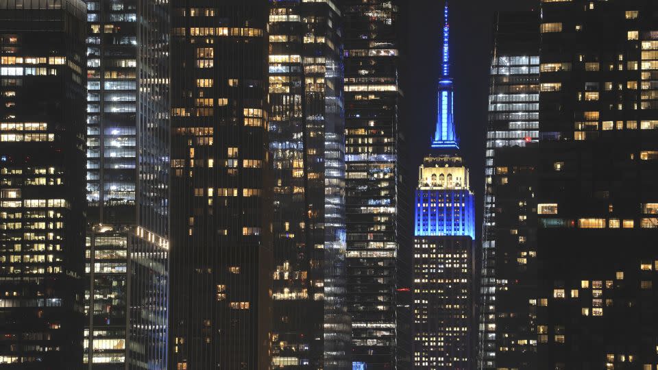 New York City's Empire State Building, illuminated in the colors of the flag of Israel on October 7. - Gary Hershorn/Corbis News/Getty Images