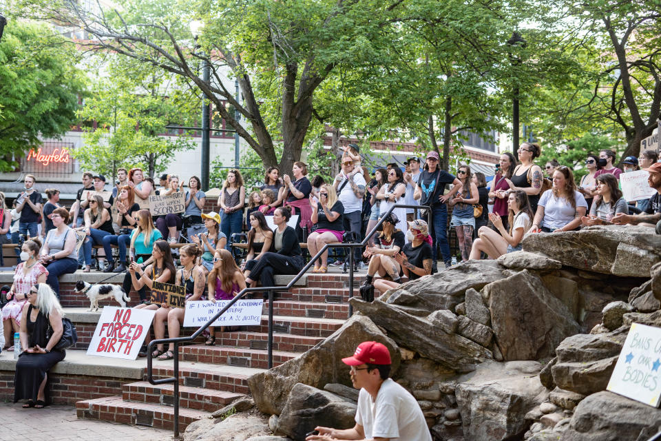 People gather in Pritchard Park to react to Supreme Court Justice's Alito leaked opinion draft regarding the possible turnover of Roe V. Wade on May 3, 2022.