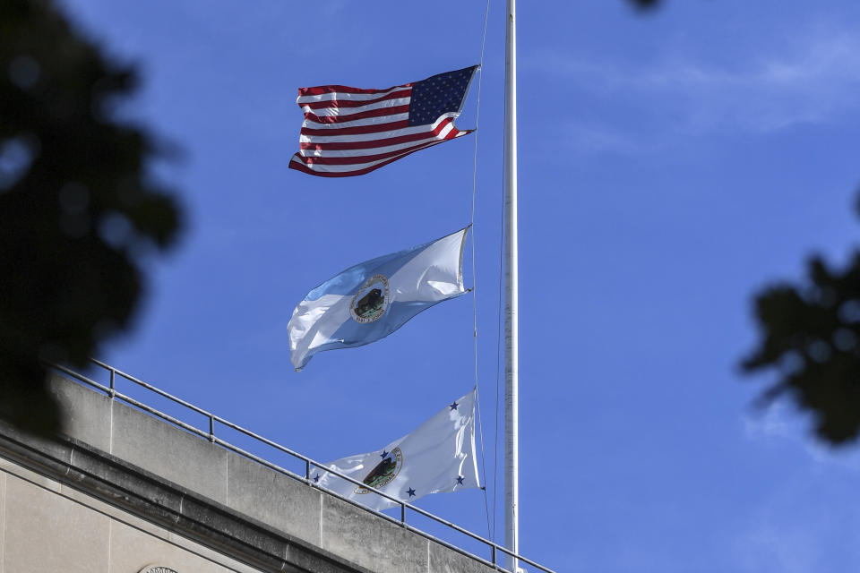 The flag for the Interior Department&rsquo;s deputy secretary, bottom, flies above agency headquarters in Washington. The middle flag represents the department. (Photo: Jonathan Newton/The Washington Post via Getty Images)