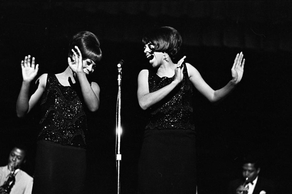 Gladys Horton and Katherine Anderson of the Marvelettes, singing on stage during a performance of the Otis Redding Show.