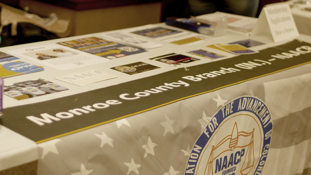 Information about being part of the Monroe County Branch of NAACP is displayed during the Black Market at Bloomington City Hall on Feb. 17, 2024.