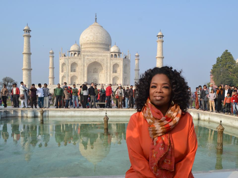 Oprah Winfrey poses in front of the Taj Mahal on January 19, 2012.   (STRDEL/AFP/Getty Images)