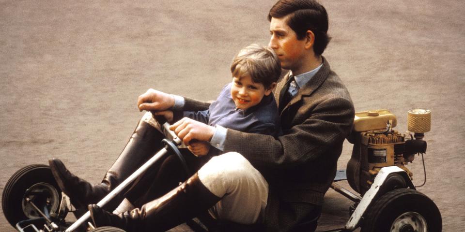 <p>Taking his younger brother, Prince Edward, on a go-kart ride on the grounds of Windsor Castle. </p>