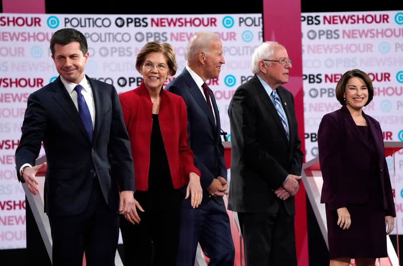 Candidates before the start of the sixth 2020 U.S. Democratic presidential candidates campaign debate at Loyola Marymount University in Los Angeles, California, U.S.