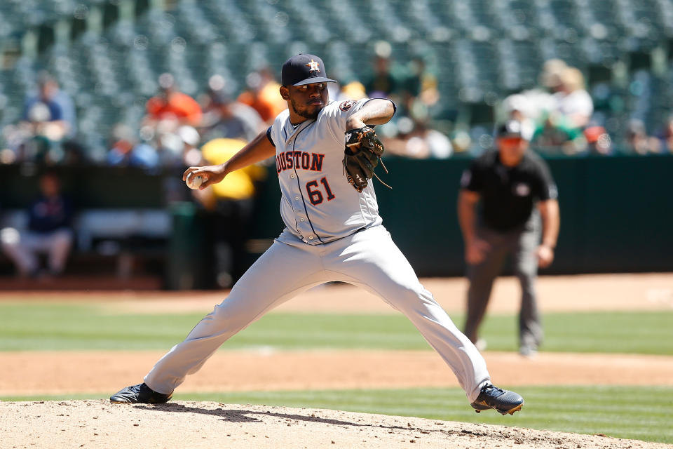 OAKLAND, CALIFORNIA - AUGUST 17: Rogelio Armenteros #61 of the Houston Astros pitches against the Oakland Athletics at Ring Central Coliseum on August 17, 2019 in Oakland, California. (Photo by Lachlan Cunningham/Getty Images)