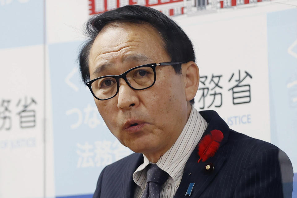 Japanese Justice Minister Yasuhiro Hanashi speaks during a press conference at his ministry in Tokyo, on Oct. 14, 2022. Japanese Prime Minister Fumio Kishida has decided to delay his departure Friday to southeast Asia to attend triple summits, apparently to sack his justice minister over his remark that his job makes news only when he signs executions.(Kyodo News via AP)