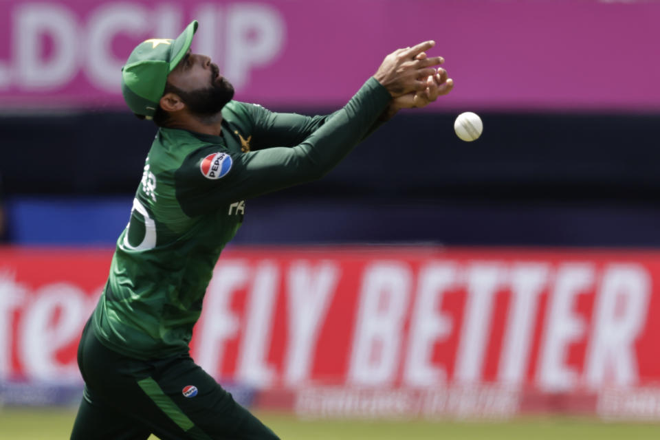 Pakistan's Fakhar Zaman fails to take the catch of Canada's Aaron Johnson during the ICC Men's T20 World Cup cricket match between Pakistan and Canada at the Nassau County International Cricket Stadium in Westbury, New York, Tuesday, June 11, 2024. (AP Photo/Adam Hunger)