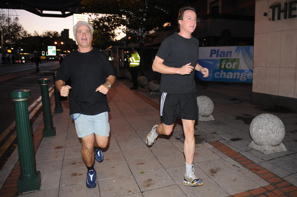 Conservative Party leader David Cameron (right) goes running this morning with Desmond Swayne MP before delivering his keynote speech to the Conservative Party conference this afternoon.