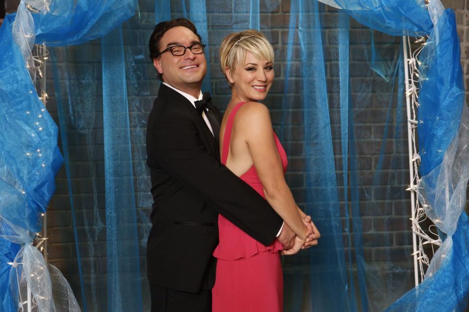 <p>Penny + Leonard = an uber cheesy prom picture that we're obsessed with. When the cast recreated a school dance in season eight, Penny wore a sleeveless fuchsia chiffon gown with a thin gold headband. </p><p><a class="link " href="https://www.amazon.com/Big-Bang-Theory-Complete-Season/dp/B000VZYPB4?tag=syn-yahoo-20&ascsubtag=%5Bartid%7C10063.g.36197518%5Bsrc%7Cyahoo-us" rel="nofollow noopener" target="_blank" data-ylk="slk:STREAM NOW;elm:context_link;itc:0;sec:content-canvas">STREAM NOW</a></p>