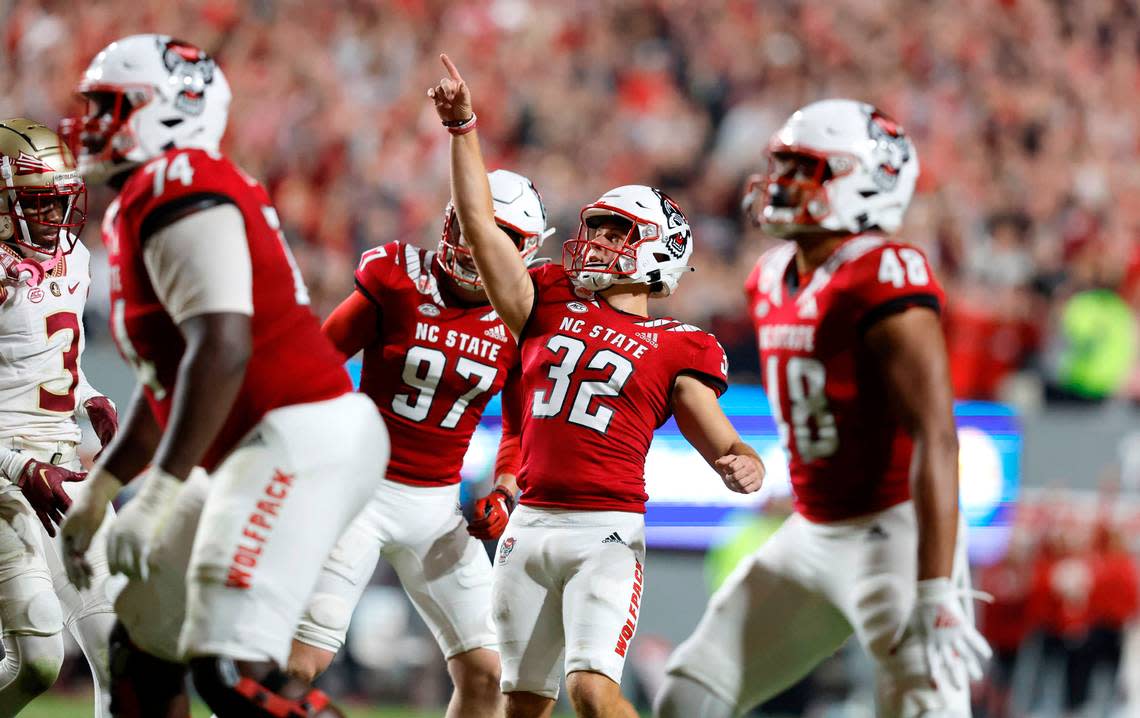 N.C. State’s Christopher Dunn (32) celebrates after hitting a 27-yard field goal to give the Wolfpack the lead during N.C. State’s 19-17 victory over Florida State at Carter-Finley Stadium in Raleigh, N.C., Saturday, Oct. 8, 2022.