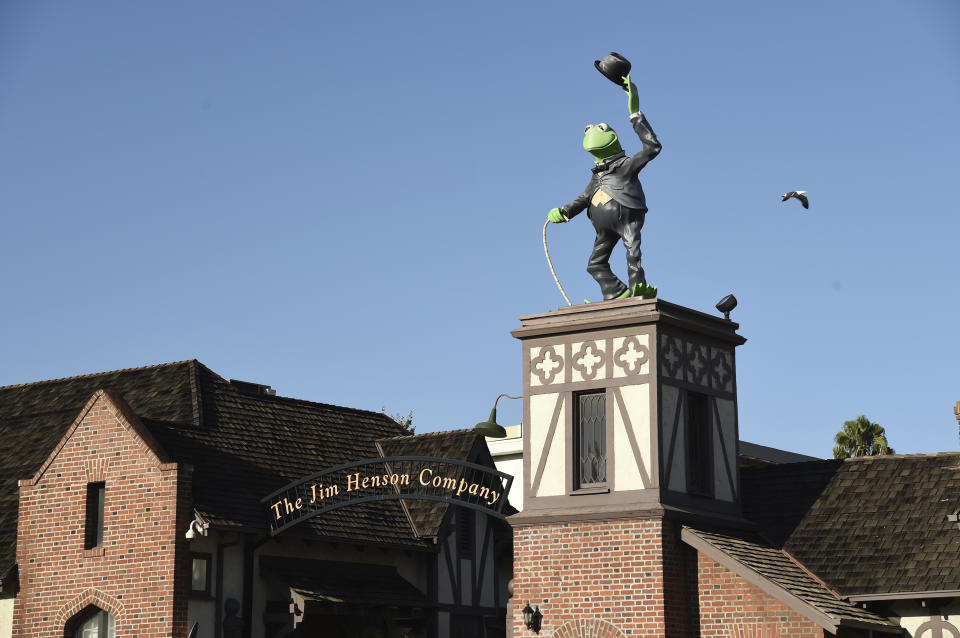 A statue of Kermit The Frog stands at the entrance to The Jim Henson Company, Tuesday, July 7, 2020, in the Hollywood section of Los Angeles. The U.S. government's small business lending program sent pandemic relief money into unexpected corners of the entertainment industry. The Muppet makers say they received about $2 million to keep their 75 workers employed through the coronavirus shutdown. (AP Photo/Chris Pizzello)