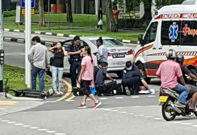 A teenage boy was injured after he was in an accident involving an e-scooter and a car at the junction of Woodlands Drive 50 and Woodlands Avenue 4 on 30 November 2017. Photo: Facebook/Singapore Road Accident