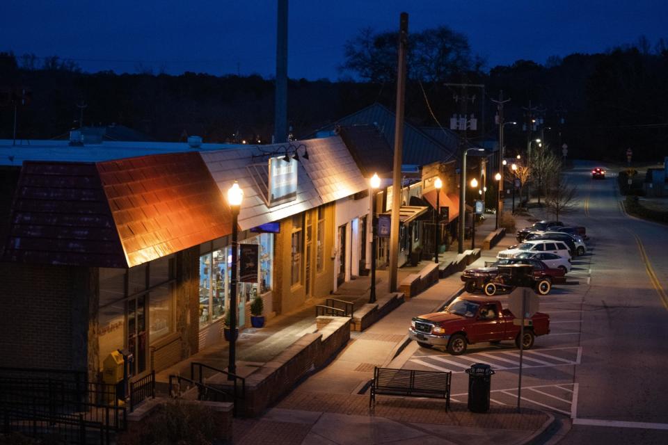 Stores in downtown Stockbridge, in Georgia's Henry County, in the evening.