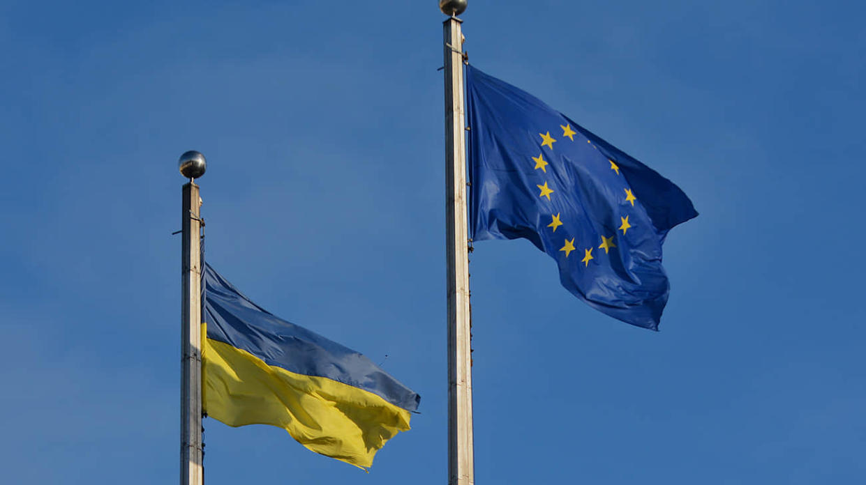 Ukrainian and EU flags. Stock photo: Getty Images